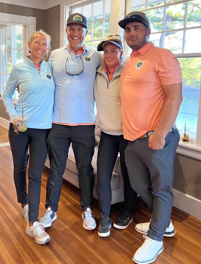 Golfing foursome savoring victory